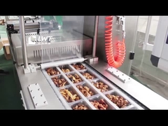 Machine à emballer sous vide des légumes braisés